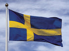 Adela dansk flag i 450 cm størrelse, synlig monteret på en båd.